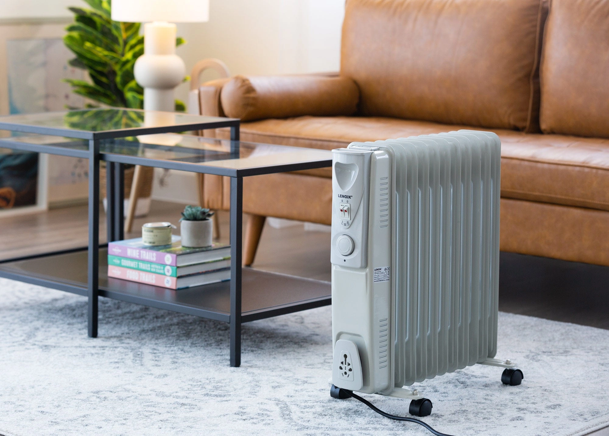 Cozy Comfort: 3-Heat Free Standing Oil Column Heater with Rolling Wheels!